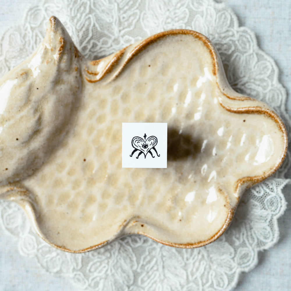 Demian, stamped impression