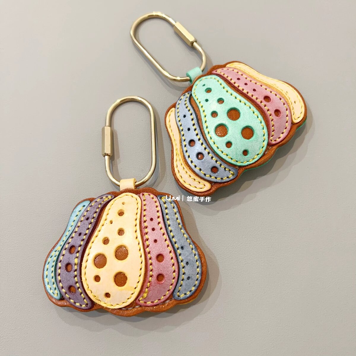 Lake-blue colourblock leather pumpkin charm detail