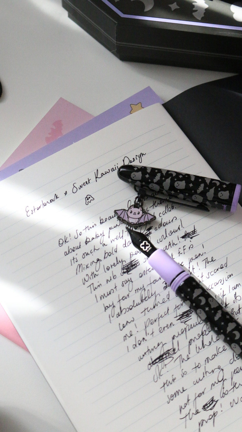 Sweetly Haunted Estie resting on a handwritten page