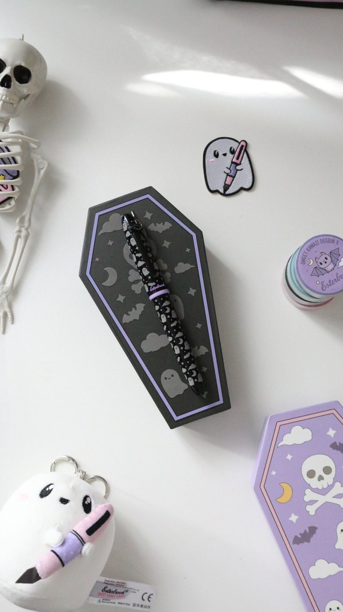 Sweetly Haunted Estie in its coffin shaped box