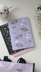 Purple bats grid notebook and black lined notebook