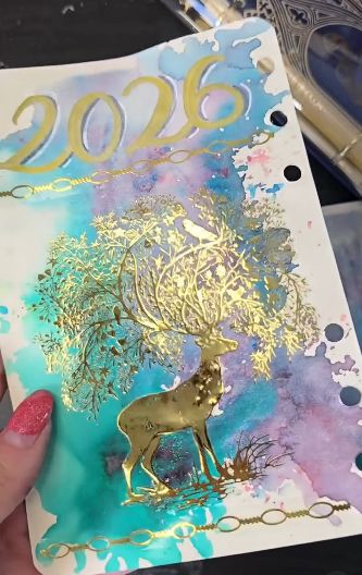 Gold deer and tree journal page, 2026